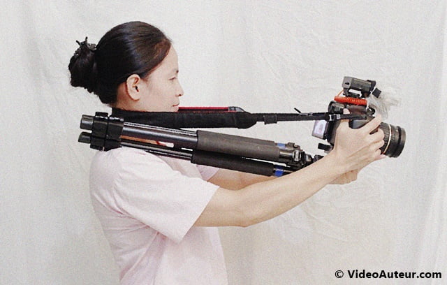 Using the tripod and camera strap as shoulder rig is a form of DIY camera stabilizer.